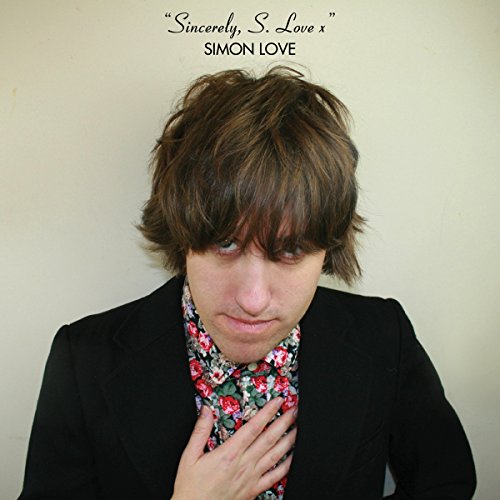 "Album cover featuring Simon Love with shaggy hair and floral shirt under a black jacket."