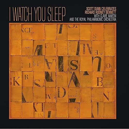 CD cover: orange abstract collage with scattered, dark letterforms.