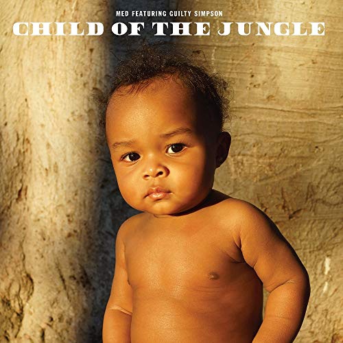 CD cover: portrait of a young child against a tree trunk.