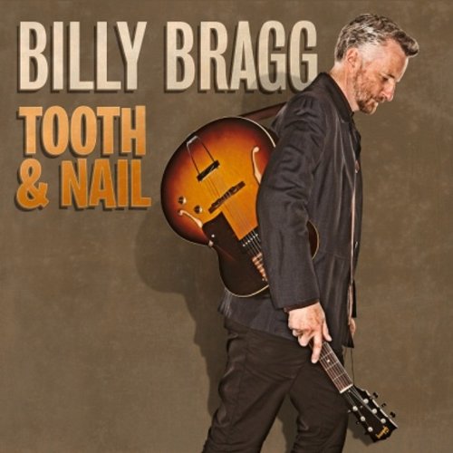 Man in black holds guitar, with "BILLY BRAGG TOOTH & NAIL" text on a brown background.