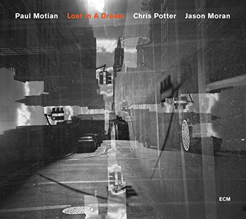 "Album cover with black-and-white city street image and multiple overlayed transparent images."