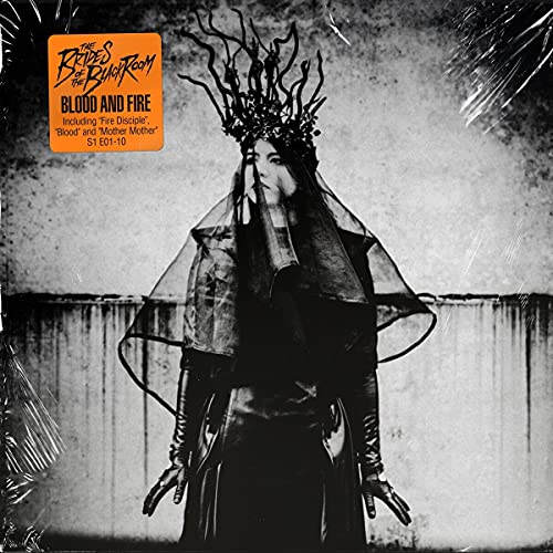 Woman in dark clothing and branch crown, album cover art.