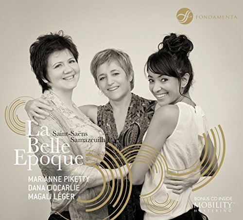 "CD cover featuring three smiling women in black and white with gold accents."