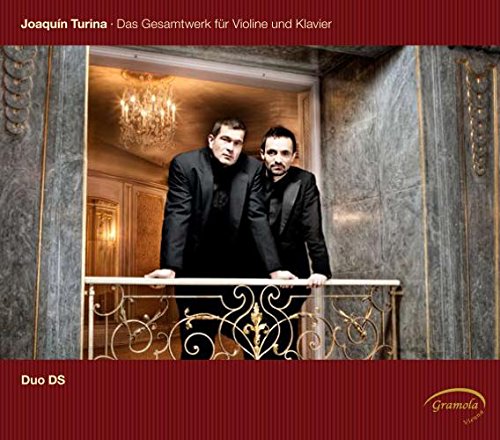 "CD cover featuring two men in black standing by an ornate railing."