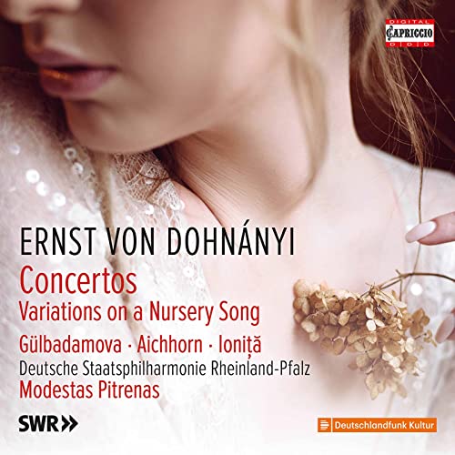 CD cover featuring a woman’s portrait and delicate dried flowers.
