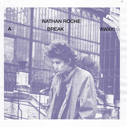 Black and white vinyl record cover featuring a man looking down.