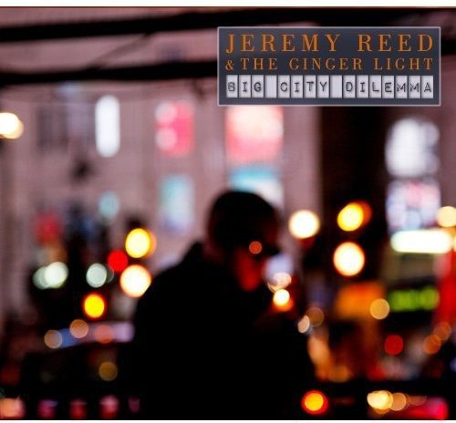 "Album cover with blurred city lights and a man in silhouette, text overlay."