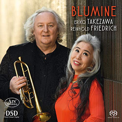 CD cover featuring two musicians and a golden trumpet.