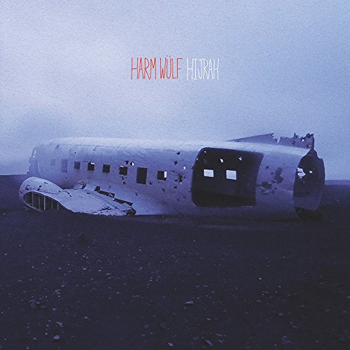 "Album cover featuring a damaged airplane on a desolate landscape with red and white text."