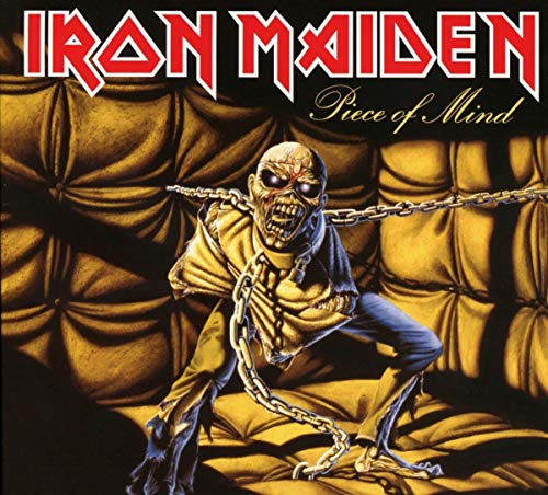 "Iron Maiden CD and case with artwork featuring a man strapped to a chair."