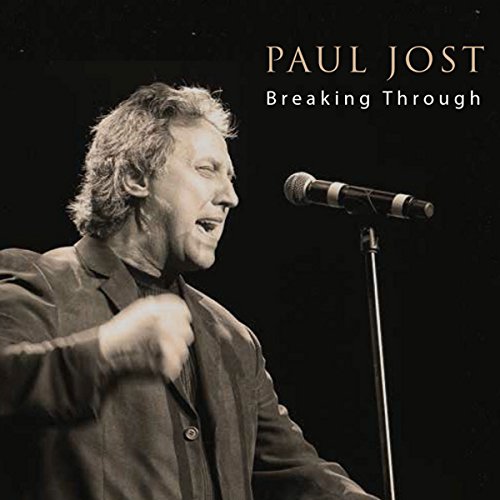 "Album cover with black and white photo of man singing into a microphone."