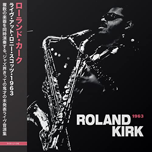 Rahsaan Roland Kirk playing multiple saxophones on a vinyl record cover.