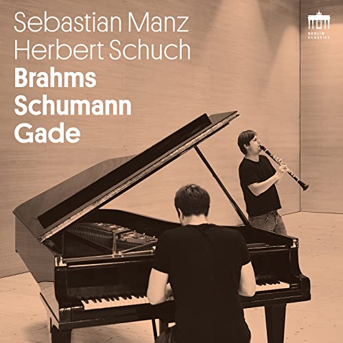 CD cover featuring a clarinetist and pianist performing together.