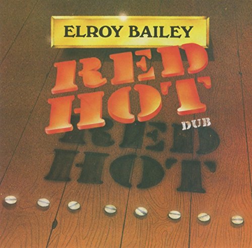 "Album cover with 'Red Hot Dub' in 3D text on wooden floor with rivets."