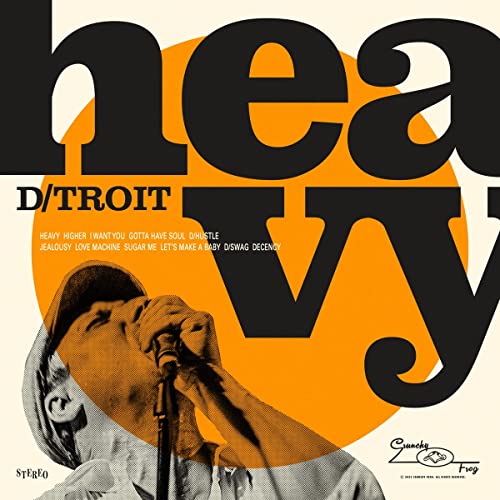Album cover for D/troit - Heavy, featuring a singer and bold typography.