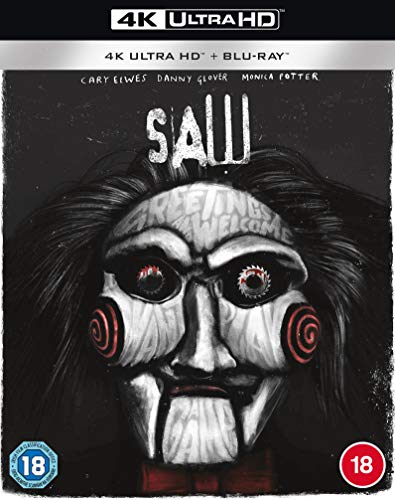 “Saw” 4K UHD Blu-ray cover featuring the Jigsaw mask with red spiral cheeks.