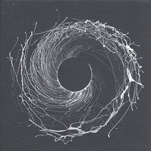 Abstract spiral of white lines on a dark gray square background.