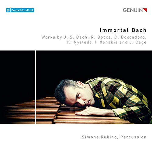 CD cover featuring a man resting on marimba, wearing a plaid shirt, against a dark background.