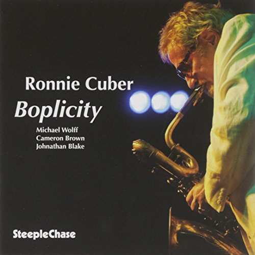 "Album cover featuring a man playing a saxophone, with white text on a black background."