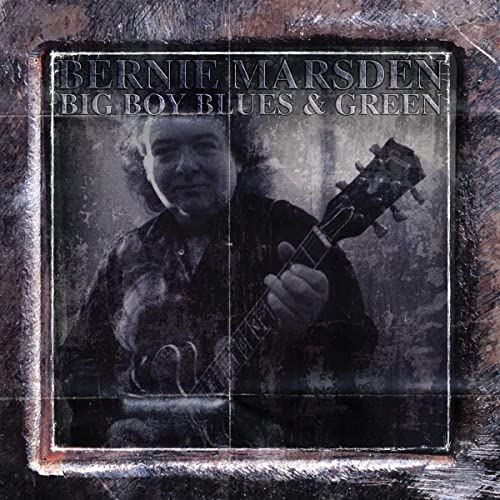 Bernie Marsden album cover featuring a portrait with a guitar.