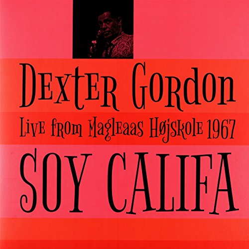 "Dexter Gordon album cover with a man singing into a microphone on a pink background."