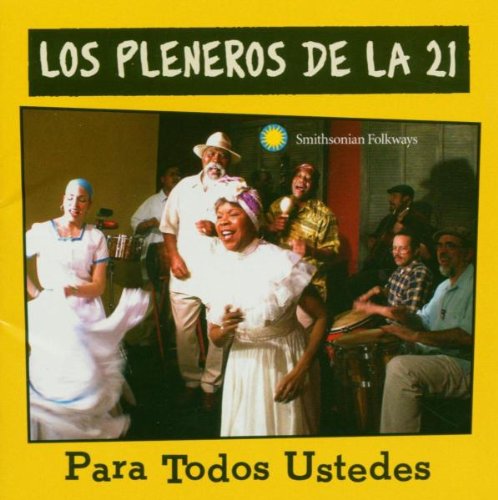 "CD cover with a yellow background and a photo of people dancing and playing instruments."