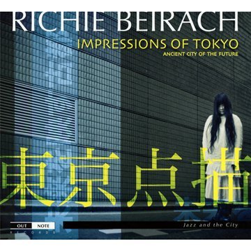 "Album cover with a woman in white standing before a grid-patterned building."