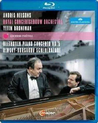 Blue-ray disc cover featuring two men with a grand piano and white text overlay.