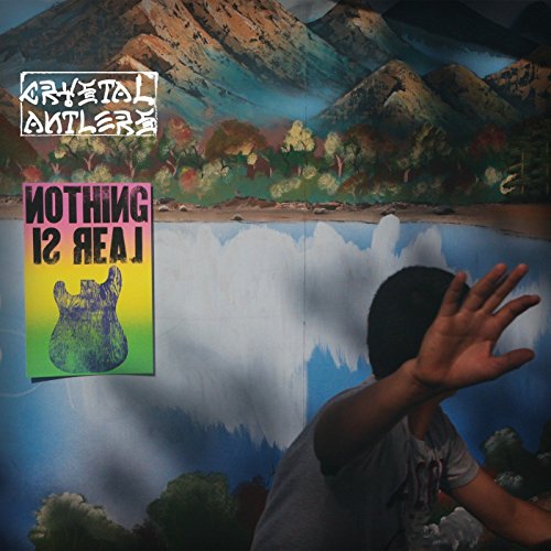 "Album cover with a child in front of a painted backdrop and 'Nothing Is Real' text."