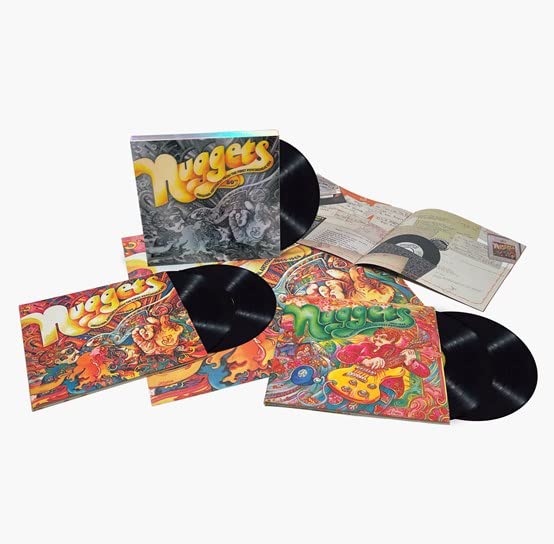 Five vinyl records and accompanying booklet with psychedelic artwork.