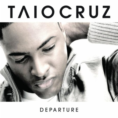 Black and white album cover for Taio Cruz’s “Departure” featuring his portrait.