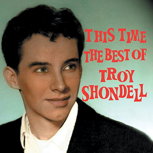 "CD cover with a young man and red text on a green background."