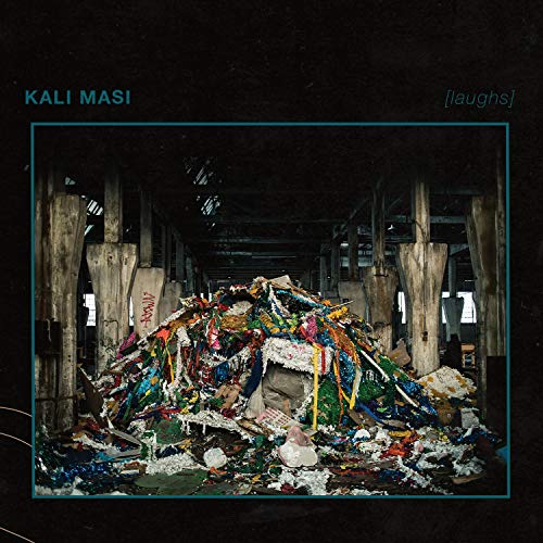 CD cover for "laughs" by Kali Masi, showing a debris pile.