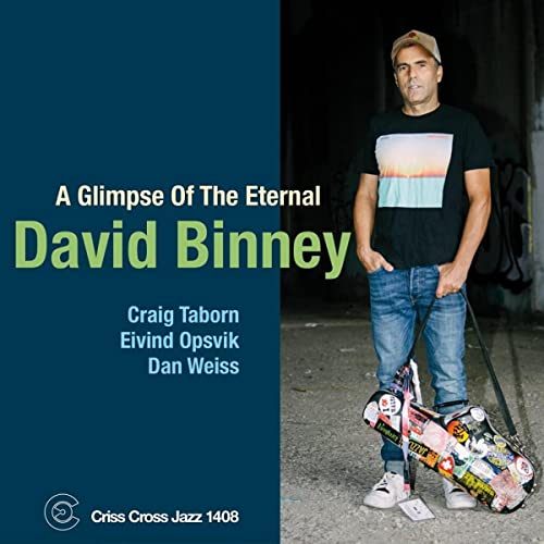 CD cover featuring David Binney standing next to a sticker-covered instrument case.