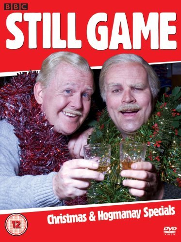 DVD cover featuring two older men with festive garlands and drinks.