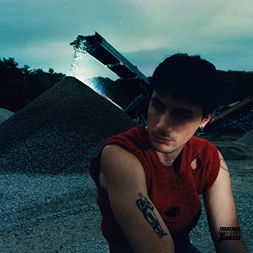Jeremy Zucker album cover, “CRUSHER,” featuring a man and gravel piles.
