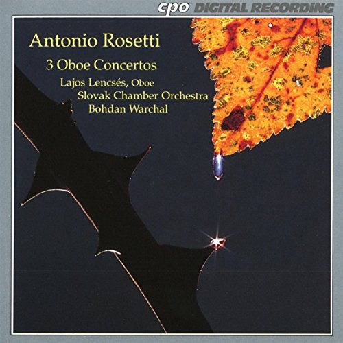 CD cover with dark background, yellow leaf, and star-like shapes, featuring text "Antonio Rosetti".