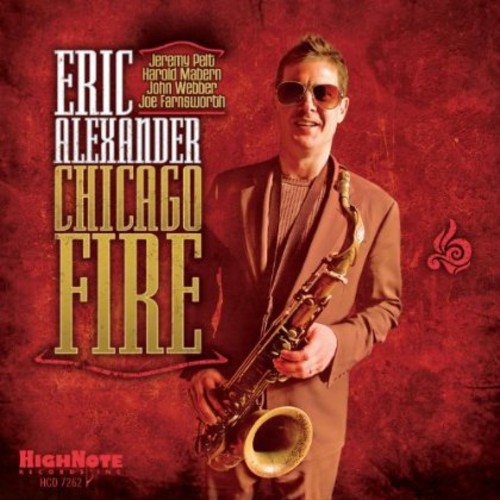 Man in brown suit holding saxophone, on red textured album cover with gold text.