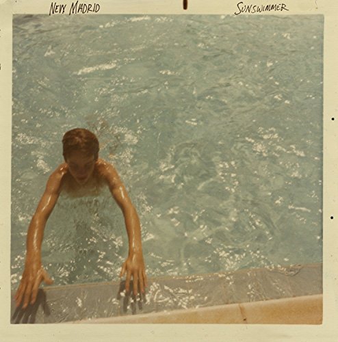 A man exits a swimming pool, captured on a Polaroid-style album cover.