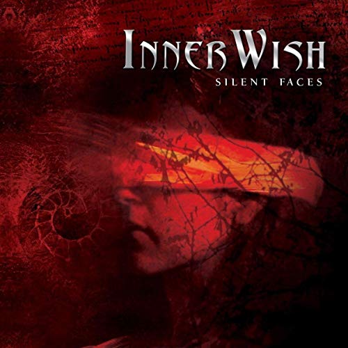 Vinyl record of Innerwish’s “Silent Faces” with red and black cover art.