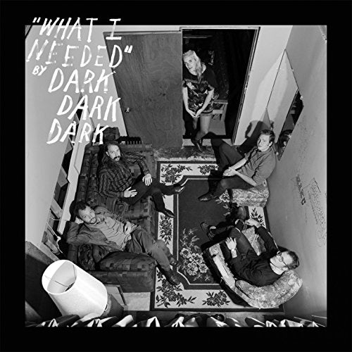 Black and white album cover with four men lounging in a cluttered, dimly lit stairwell.