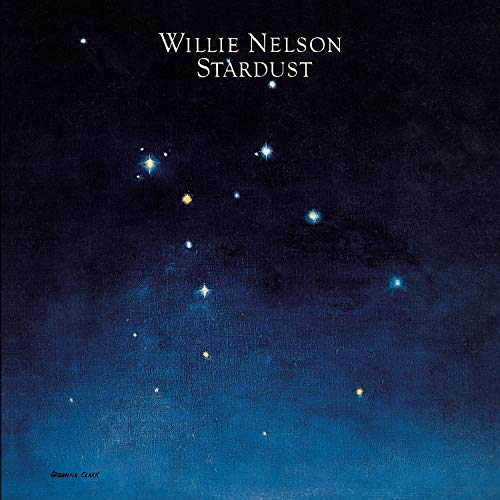 Album cover for Willie Nelson’s “Stardust” with a dark blue starry sky.