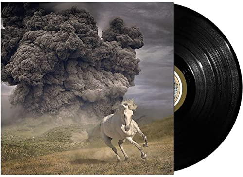 Vinyl record with cover art of a white horse and erupting volcano.