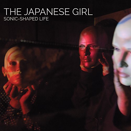 Album cover for "Sonic-Shaped Life" featuring a red-lit, distorted portrait.
