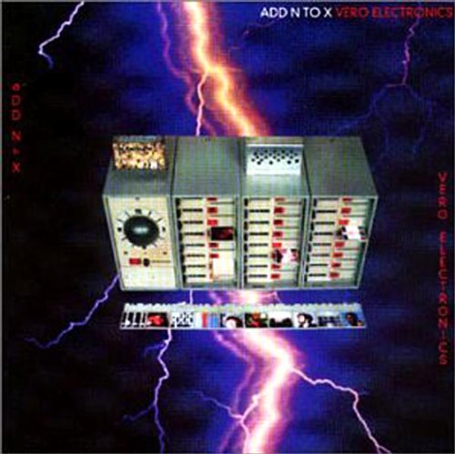 CD cover with electronic equipment and lightning against a dark blue sky.