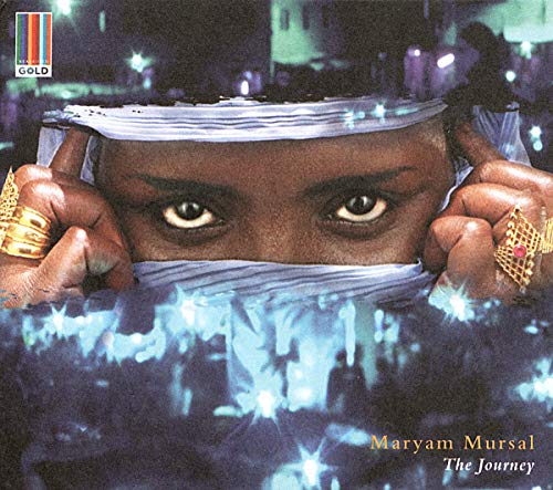 Close-up of Maryam Mursal’s eyes partially covered by blue fabric, gold rings.