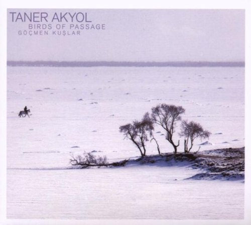 "Album cover featuring a snowy landscape with trees and a person on horseback."