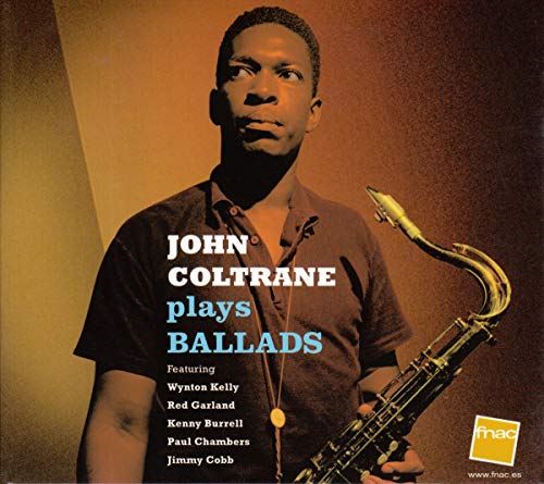 John Coltrane holding a saxophone on the cover of the album Plays Ballads.