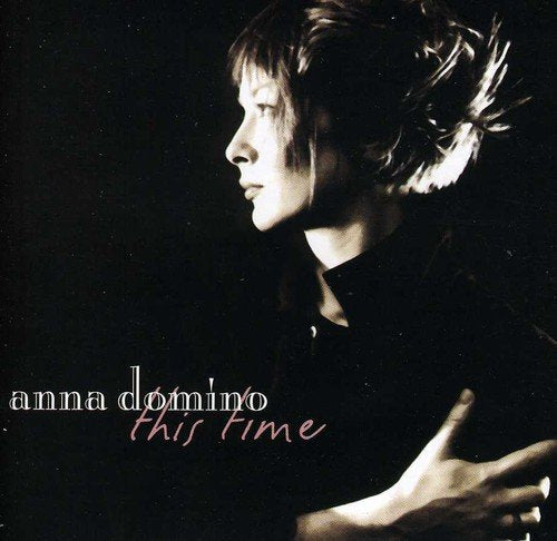 "CD cover featuring a black-and-white profile photo of a woman with short hair."