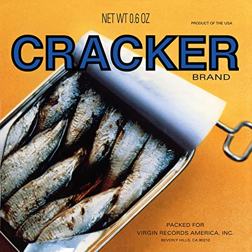 Vinyl album cover featuring an open tin of sardines on an orange background.